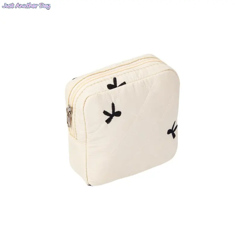 Beige/black butterfly