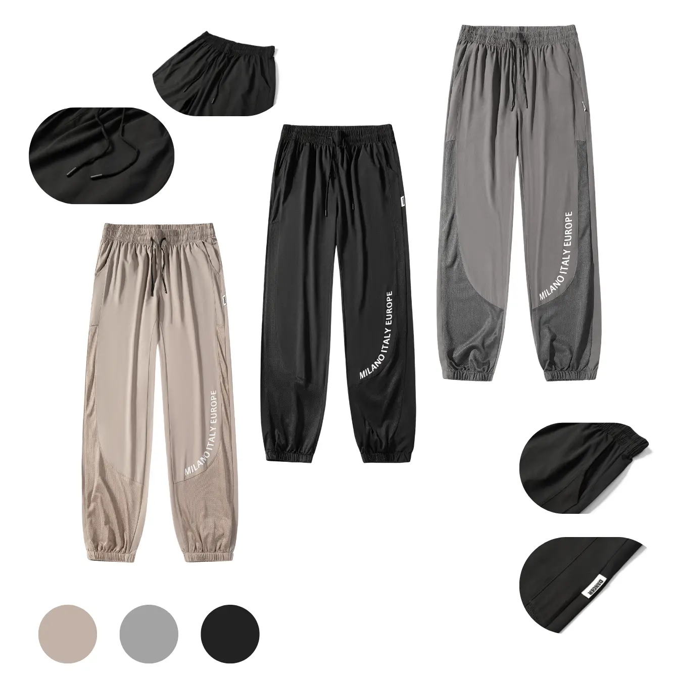Men’s mid-rise athletic jogger pants featuring a spliced design, fully elastic waistband with drawstring, reinforced seams throughout with visible stitching, mesh fabric panels with curved leg openings for breathability, vertical letter print along the si