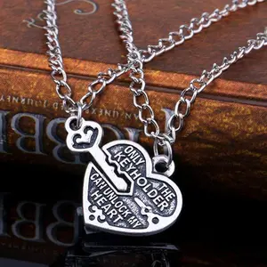 A set of fashionable and creative couple necklaces with personalized keys, heart-shaped key locks, letter pendants, and student collarbones