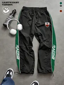 Men's Lightweight Racing style high street leggings, black and green contrasting color side letter printing, badge trendy casual pants, comfortable and skin-friendly fabric drawstring elastic waist versatile sweatpants, comfortable to wear in spring and s