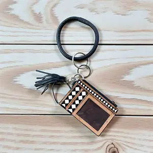Checker tooled leather card holder wristlet 