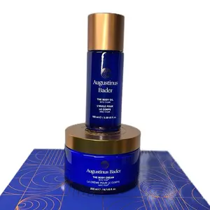 Augustus Bader: The Body Collection- Both in royal blue bottle and jar with gold tops.