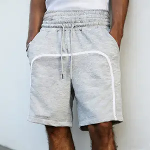 Men’s loose-fit drawstring casual shorts with twin seams, breathable and skin-friendly, suitable for everyday commuting, street style, and sports-casual wear