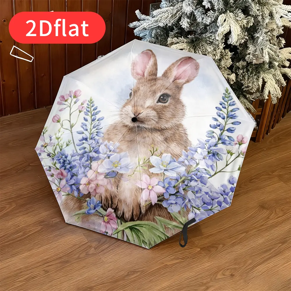 An Easter Bunny Folding Umbrella – featuring an adorable bunny design with blooming flowers, lightweight and portable for everyday use, durable canopy made of sturdy plastic and metal, creative pattern, perfect as a