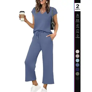Women’s two-piece loungewear set featuring a short-sleeve top and nine-point pants; solid-color comfortable homewear suit, casual for daily use