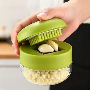 Garlic Press and Slicer, Manual Crusher and Chopper, Easy Clean Cutting Board, Compact Handheld Design, Dishwasher Safe