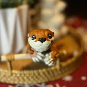 Cute articulated otter, flexi fidget toy