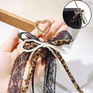 Women's Leopard Print Faux Pearl Bow Keychain For Bags, Light Gold Heart Spring Clip, Lace Butterfly Pendant, Elegant Metal Accessory