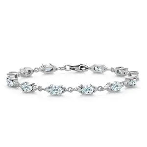 Gem Stone King 925 Sterling Silver Sky Blue Aquamarine and White Moissanite Tennis Bracelet For Women (6.91 Cttw, Gemstone Birthstone, Oval 6X4MM, 6.5, 7, 7.5 Inch)