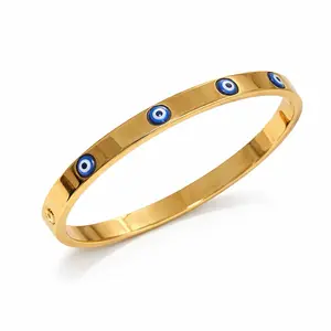 Mystique signature Minimalist 18k Gold Plated Stainless Steel waterproof Evil Eye Bracelet with Blue Eye Charms for Women Elegant Fashion Accessory