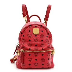Pre-owned MCM Canvas Backpacks Visetos Side Stud X Mini Stark Bebe Boo Backpack Corail