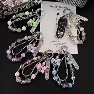 Rhinestone Butterfly Phone Charm Strap - Handmade Beaded Wristlet Lanyard with Sparkling Details, Y2K Aesthetic Accessory for Phone Cases, Bags, Keychains