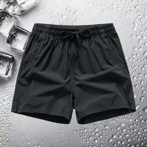 Men's outdoor fashion shorts with pockets and an adjustable drawstring waist. The fabric is comfortable and suitable for everyday wear, work, travel, outdoor activities, and fitness activities. Casual, breathable summer style with a single color and zippe