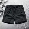 Men's outdoor fashion shorts with pockets and an adjustable drawstring waist. The fabric is comfortable and suitable for everyday wear, work, travel, outdoor activities, and fitness activities. Casual, breathable summer style with a single color and zippe