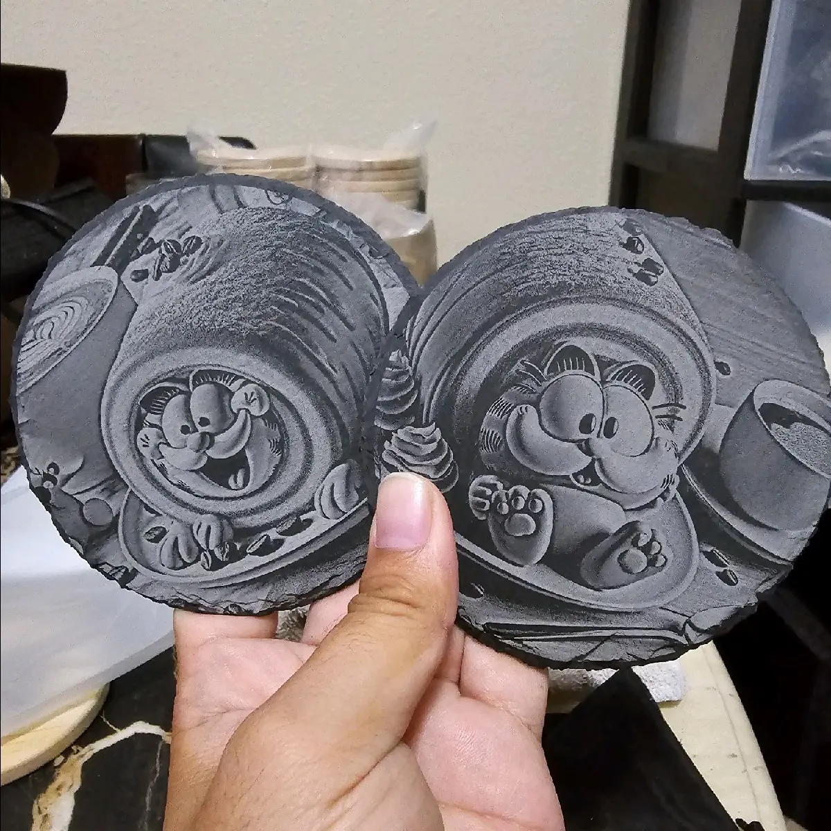 Custom laser-engraved Garfield coasters (slate/stone) come in a set.