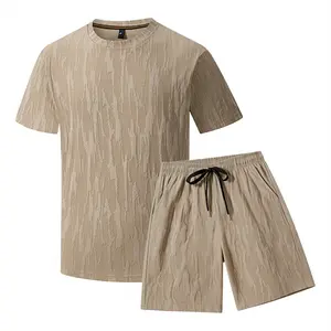 Men’s solid-color textured crew-neck T-shirt and drawstring-waist shorts pajama set; short-sleeve top and shorts two-piece set; plus-size men’s clothing; casual, comfortable men’s home sleepwear; men’s apparel; home pajamas.