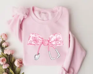 Pink Coquette Nurse Stethoscope Bow Sweatshirt, Gift for Nurse, Bow Oversized Shirt, Nurse Appreciation, Christmas Gift for Nurse, Pink Bow