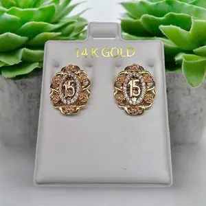 15 Años earrings 14k