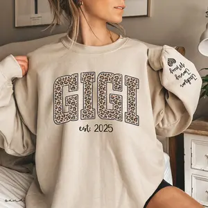 Custom Leopard Gigi Sweatshirt With Kid Name On Sleeve, Personalized Gigi Sweatshirt, Christmas Gift Gigi Est 2025 Sweatshirt