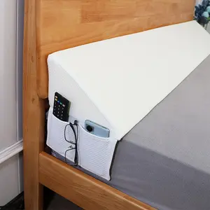 Bed wedge pillow - a mattress filler and headboard support suitable for use while lying on your back, post-operatively, and during pregnancy - fills the 0-7 inch gap between the headboard and the mattress or wall. Sleep backrest pillow.