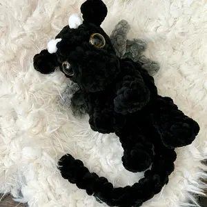 Crocheted Black Onyx Storm inspired baby dragon