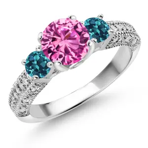 Gem Stone King 925 Sterling Silver Pink Created Sapphire London Blue Topaz and White Moissanite Engagement Ring For Women (2.40 Cttw, Gemstone September Birthstone, Round 7MM and 4MM)