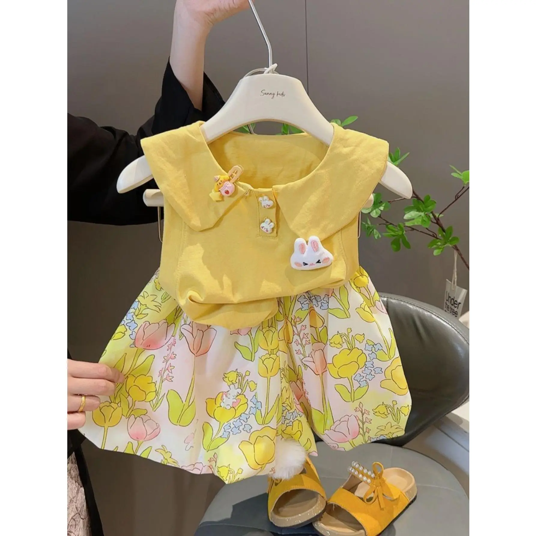 Adorable Summer for Girls Featuring a Stylish Top Paired with Floral Puffy Shorts, Complete with a Fun Cartoon Design, for Outdoor