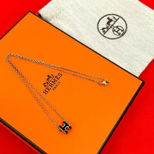 Pre-owned HERMÈS Brass Small Leather Goods Mini Pop H Necklace