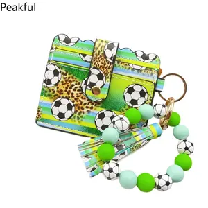 Sporty Beaded Wristlet Wallet with Ball Prints—Featuring Baseball, Football, Soccer, and Volleyball Styles. This exquisite beaded wallet makes the perfect gift for friends and family.