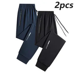 Soft, stretchy polyester–spandex jogger pants and tapered fitness leggings with zippered pockets, a drawstring waist, and a mid-rise design—breathable knit activewear suitable for spring and autumn outdoor activities—machine washable, regular fit