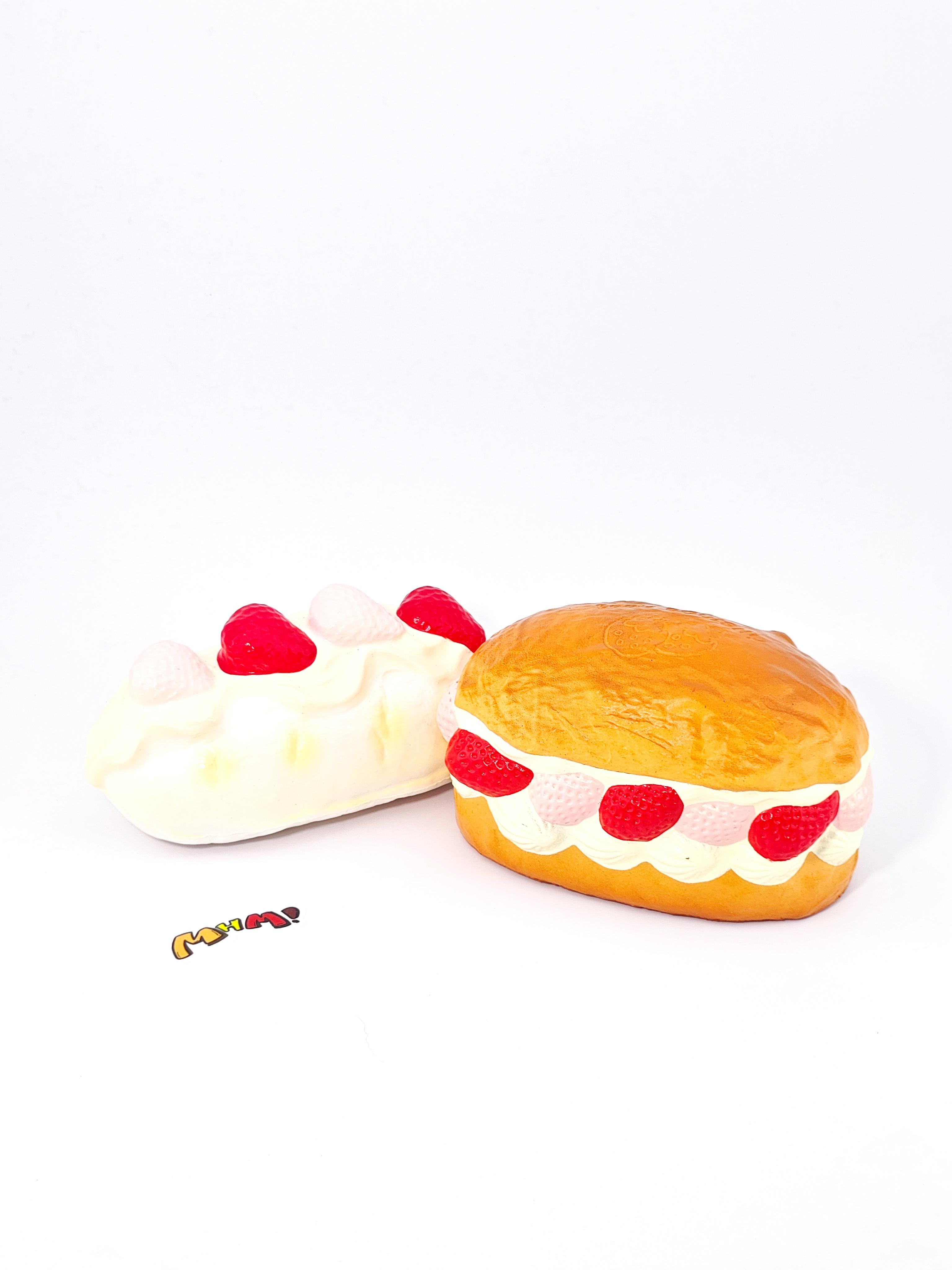 MHM Squishy Pink Strawberry White Cream Bread scented stress relief toy features a sticky, wet-soft, slow-bounce pastry texture for tactile fun