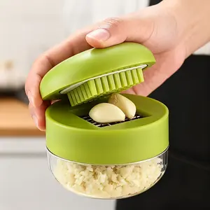 Heavy-duty Garlic Squeezer and Shredder | Manual Crusher and Shredder with Easy-to-Clean Shredder Plate, Compact Handheld Design, Plastic, Dishwasher-Friendly