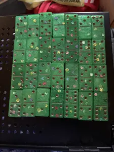 Green emoji dominos