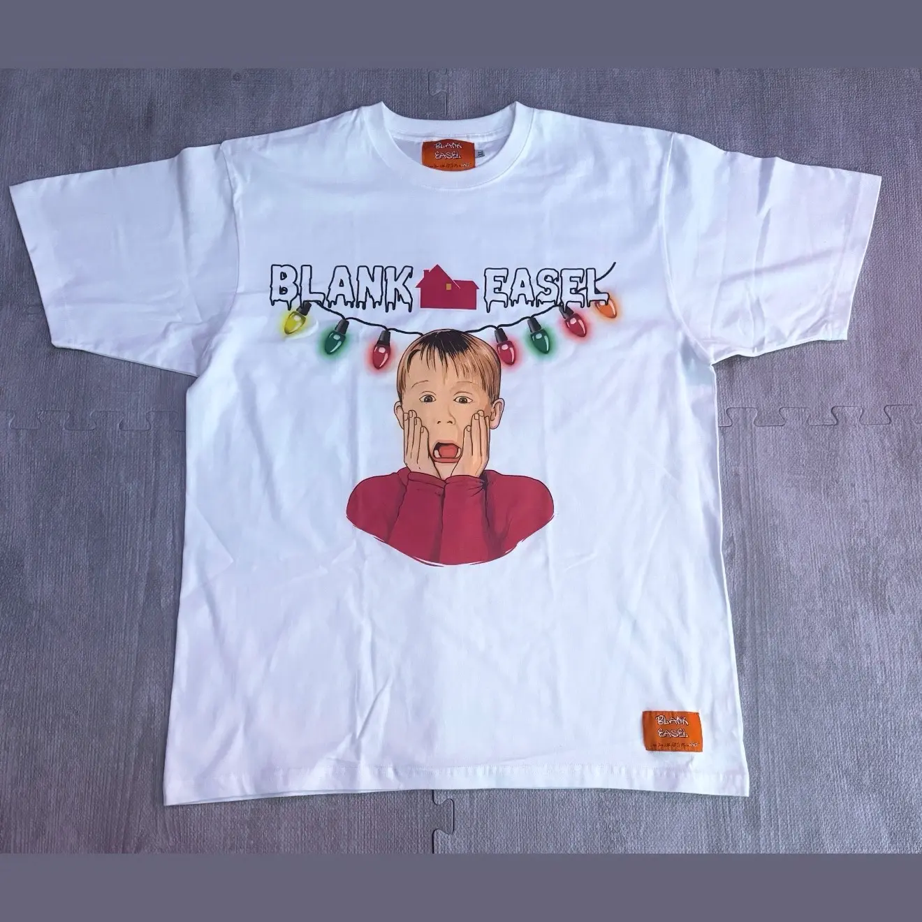 Blank Easel “Christmas at Kevin’s” Tee