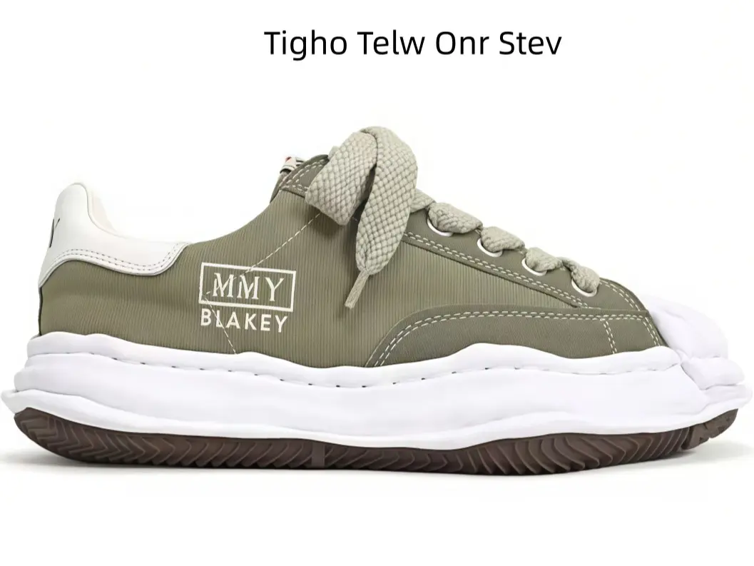 This muted olive shell toe shoe with white heel trim and wavy thick sole matches casual shorts to create soft earth tone fits for office commutes and downtown casual shopping