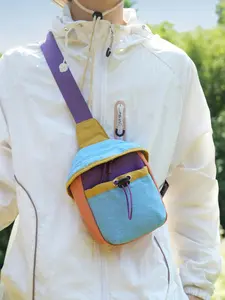 1pc Men's contrasting mini crossbody bag, outdoor energetic style with drawstring design, suitable for hiking, leisure gatherings, and daily affairs