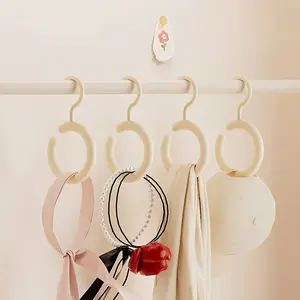 Riding the Space - Saving Organization Trend! This 2 - Pack Rotating Hook Set is a MUST - HAVE! 💯 Drill - Free, Rotatable, Great for Scarves, Hats, Bags! Neaten Up Your Closet, Store or Travel Gear Effortlessly! 🌟 #CuteHome #ClothesOrganizer