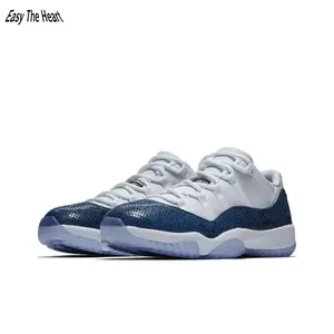Streetwear low kicks deliver cool two-tone reptile print vibe, blending soft breathable woven mesh and shiny snake grain leather, white-navy color blocking, breathable lining and grippy icy rubber sole, perfect for smart casual layered daily outfits