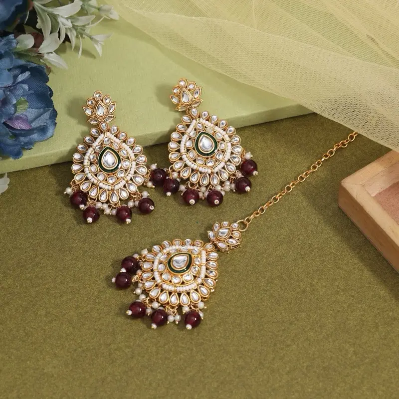 Maroon bead kundan tikah and earring set with green contrast
