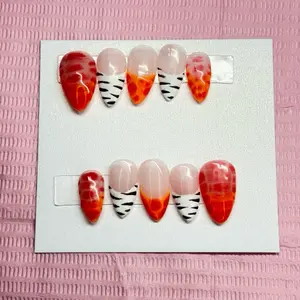 orange and red zebra nails