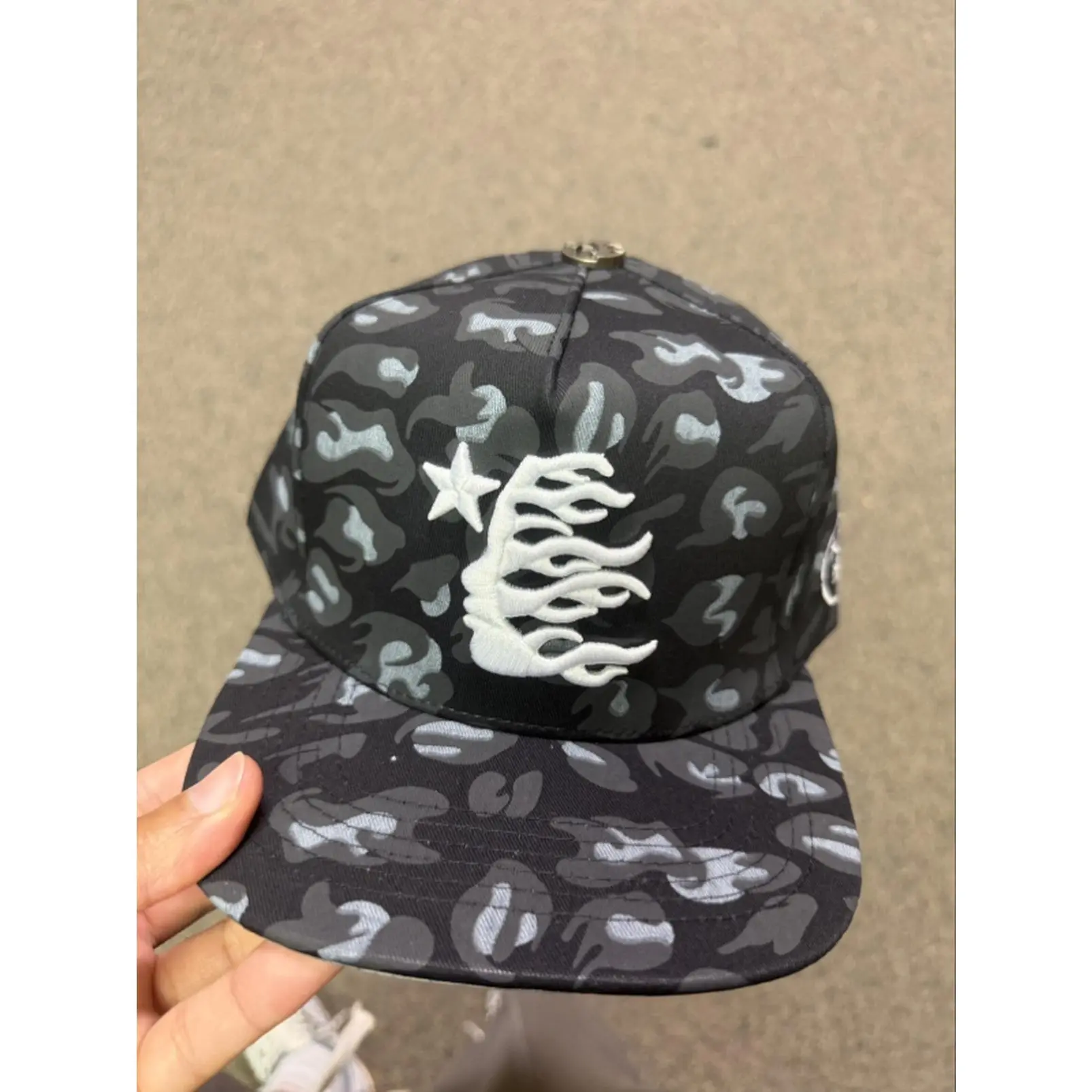 Hellstar Black Camo Baseball Cap with White Flame Design