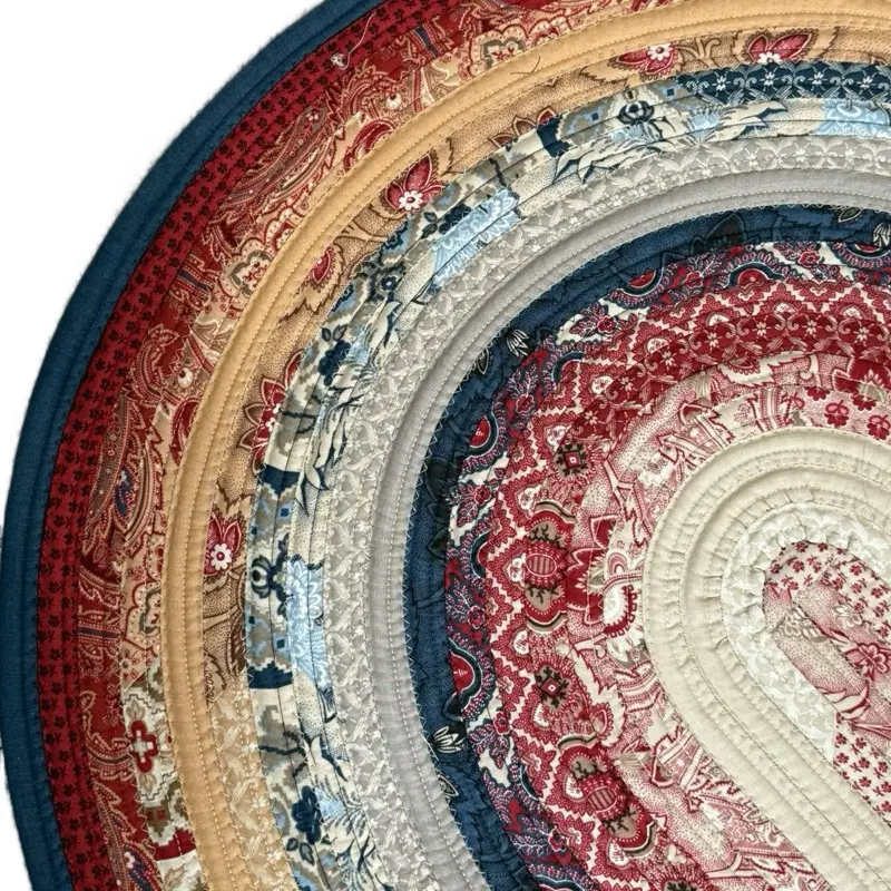 26” x 44” oval jelly roll rug ( French general)