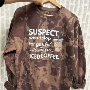 Suspect won’t stop for gas but will stop for iced coffee crewneck. Suspect challenge crewneck.