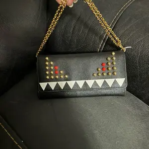 Pre-owned FENDI coated canvas Small Leather Goods PreOwned Monster Wallet on Chain – Black Leather