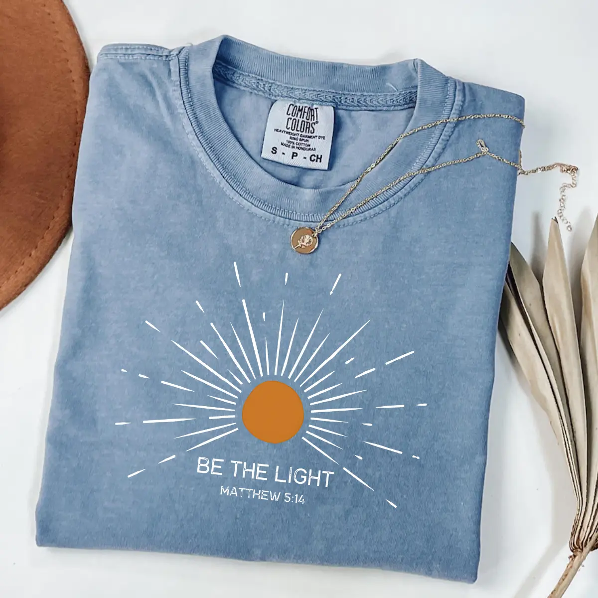 Comfort Colors Be the Light Christian T-Shirt, Matthew 5:14 Scripture with Radiating Sunburst Graphic Design Faith Unisex Shirt