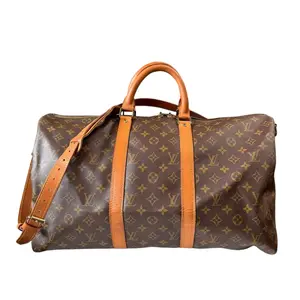 Pre-owned Louis Vuitton coated canvas and leather Travel Bags Monogram Bandouliere Keepall 50