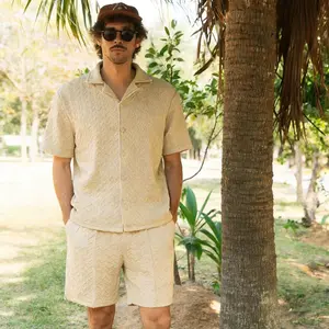 Men’s summer casual set featuring a button-front shirt and drawstring shorts; suitable for casual vacations; solid-color outfit.#SummerVibes