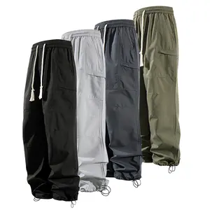 Men's Loose  Pocket Drawstring Waist Cargo Pants Casual Comfy Zipper Cargo Pants for Daily Outdoor Wear Baggy Trousers in