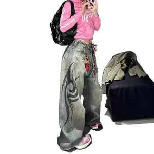 Low Rise Acid Washed Baggy Jeans With Tribal Print And Streetwear Vibe, Curvy-Friendly Design Perfect For Night Out Events And Curating Grunge Aesthetic Fits
