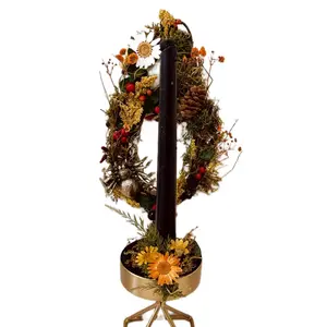 Black metal custom candle holder featuring real dried flowers, pinecones and a golden tarantula with a black candle. Witchy moody vibes perfect for any room  Decor